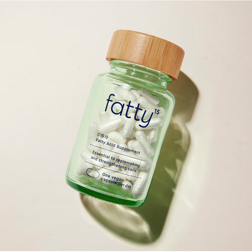 Fatty15's C15 supplement bottle on white background.
