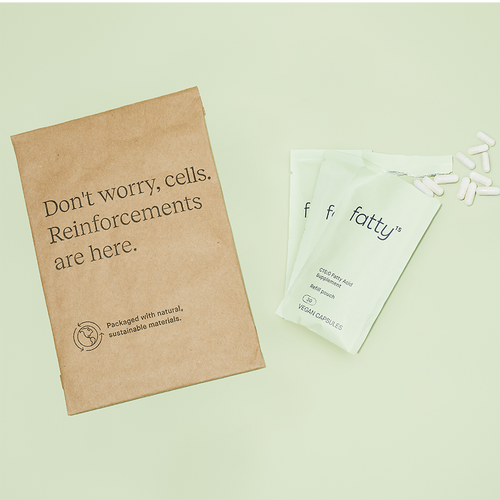 Pack of Fatty15's C15 supplement capsules with eco-friendly packaging.